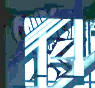same image, zoomed in, focusing on what appears to be graffiti