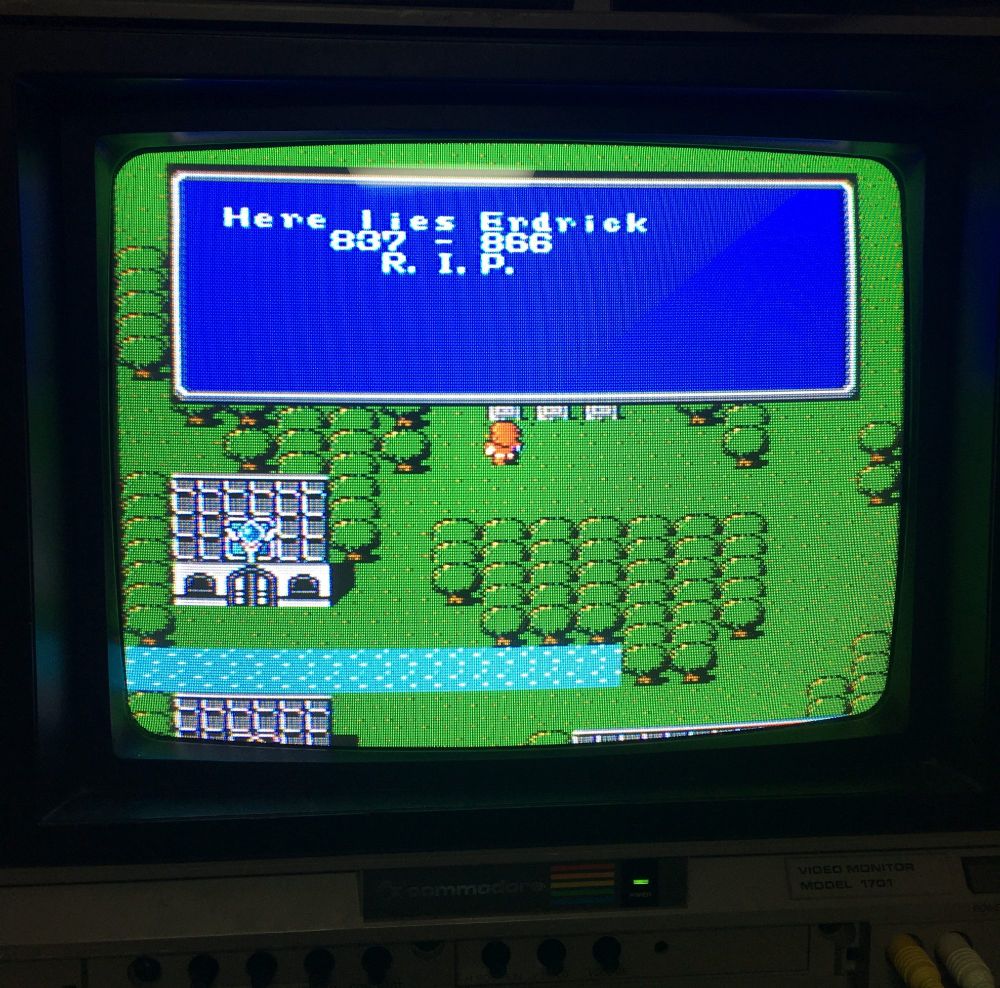 Here lies Erdrick message in Final Fantasy, but on a Commodore 1701 monitor.