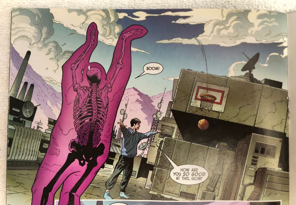 Photo of a comic panel from X-Men Vol 6 #20 (2025). Shows Glob Herman taking an outside (basketball) shot, saying “Boom” and it swishes in. Someone else says “How are you so good at this, Glob?” 