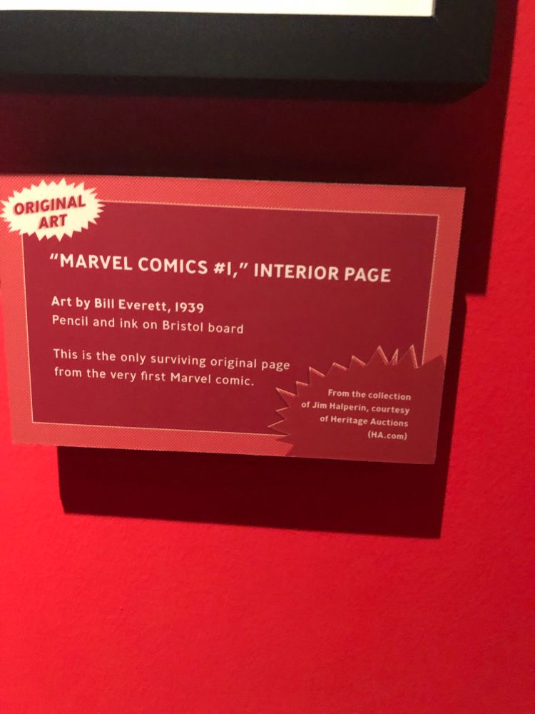 Photo (from a museum exhibit) of the museum text label for an Original Art comic page from Marvel Comics #1 (1939). Says it is the only known surviving OA page from that comic book