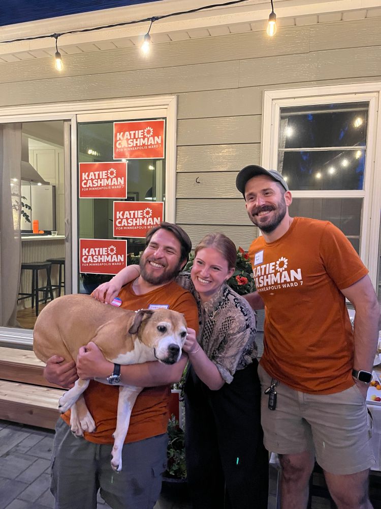 Council-member Cashman posing with our friends and their cutie pie dog, Judy