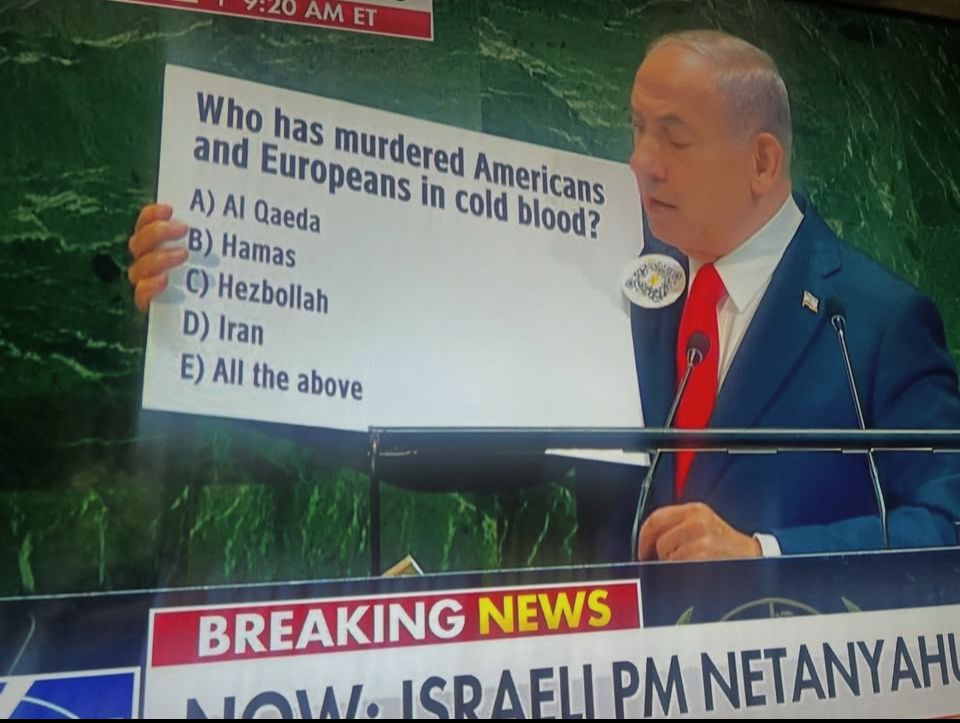 Screen grab of Netanyahu during his UN speech holding a poster that asks:
Who has murdered Americans and Europeans in cold blood?
A) Al Qaeda
B) Hamas
C) Hezbollah
D) All of the above 