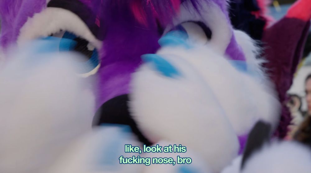 a screenshot from the further confusion 2025 vlog depicting chase getting nose baps with a caption of tecario saying 