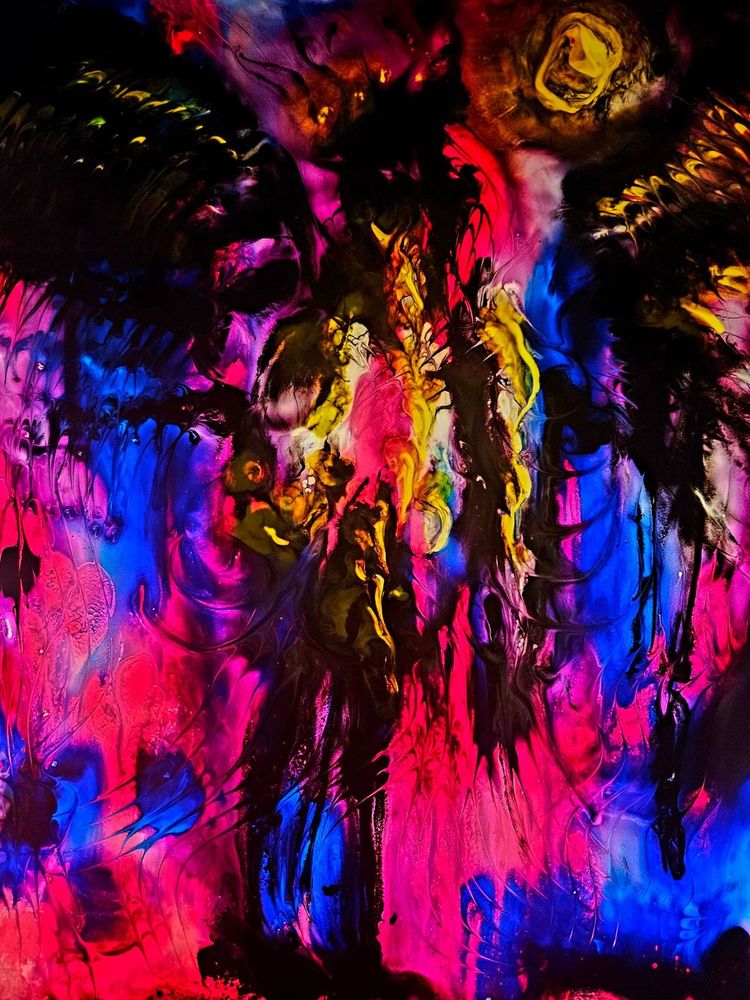 a majestic, shadowy figure with wings looms over a world of blue and purple flame, with the moon glowing down on her. it is all very abstract.