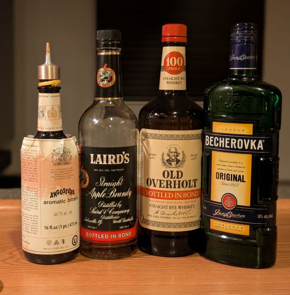 The bottles of ingredients for the cocktail 
