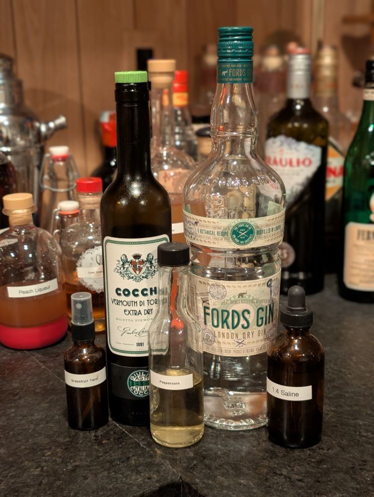 The bottles of ingredients for the cocktail 