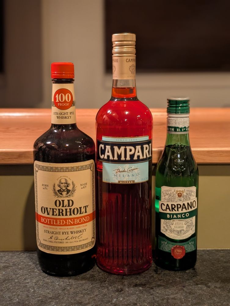 The bottles of ingredients for the cocktail 