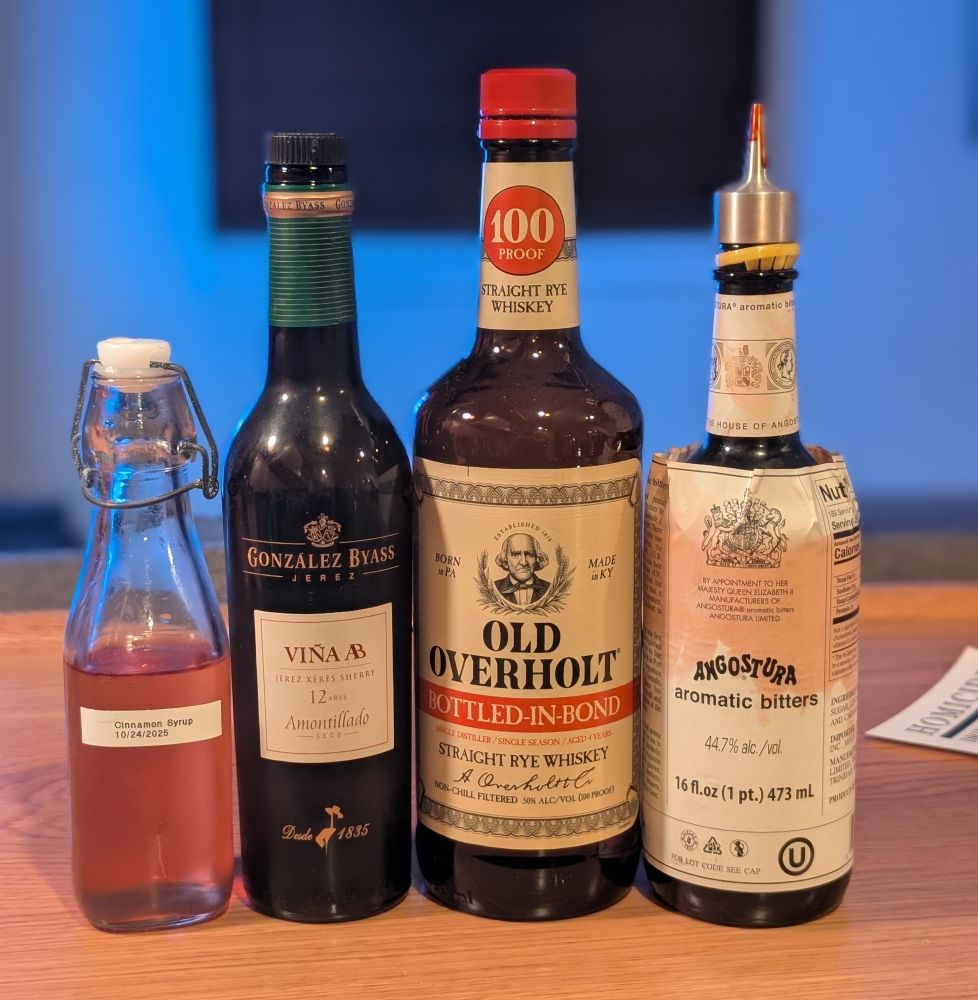 The bottles of ingredients for the cocktail 