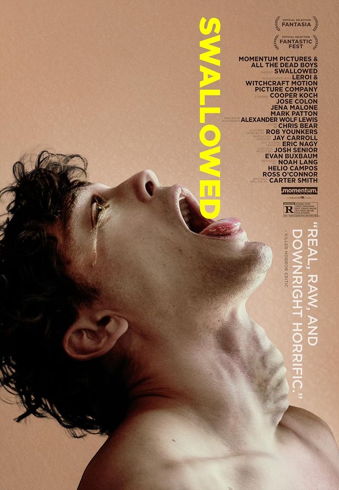 Movie poster for Swallowed (2022). A white man points his open mouth upward while the title of the movie is positioned like he’s about to swallow it. The movie’s credits are listed on the right hand side of the poster