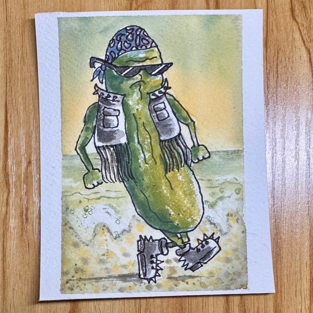 Sharpie and gouache pickle wearing a bandana, sunglasses, a fringe leather vest and spikes boots on a pickle juice beach. Don’t ask me how or why, but this is inspired by Hampton Beach in New Hampshire. 
