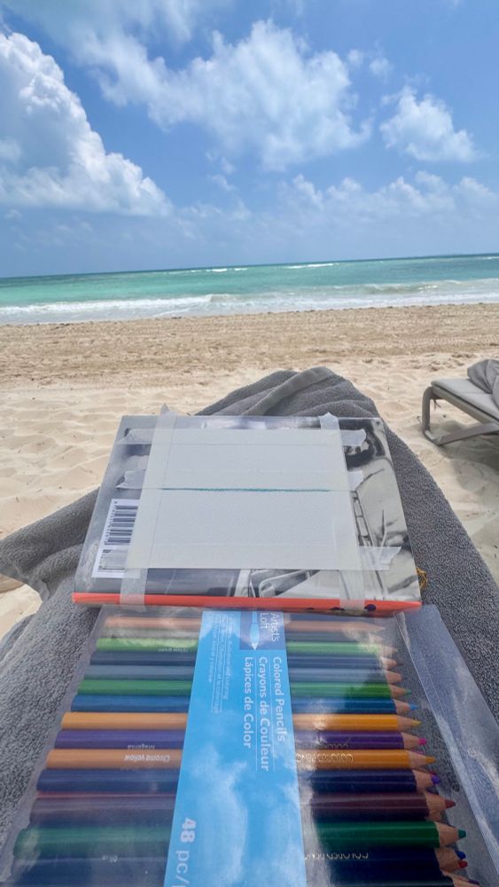 Draft of a colored pencil rendering of a live beach scene 