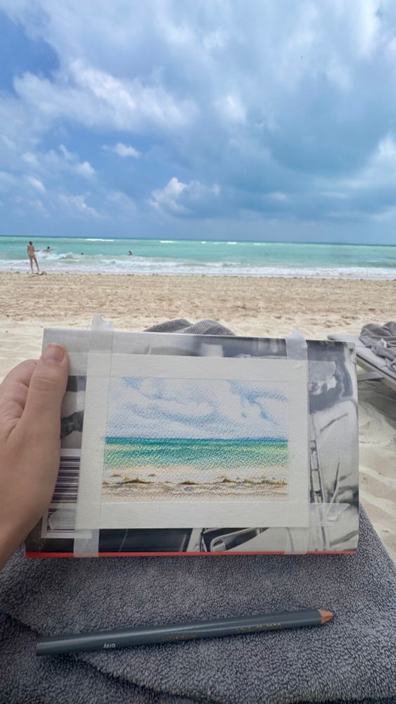 Draft of a colored pencil rendering of a live beach scene 