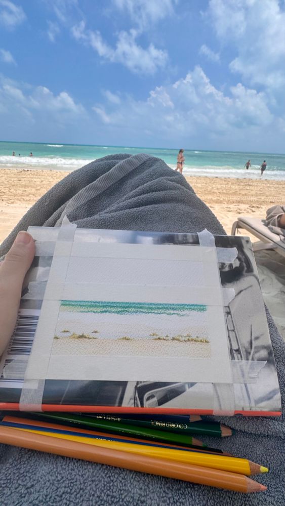 Draft of a colored pencil rendering of a live beach scene 