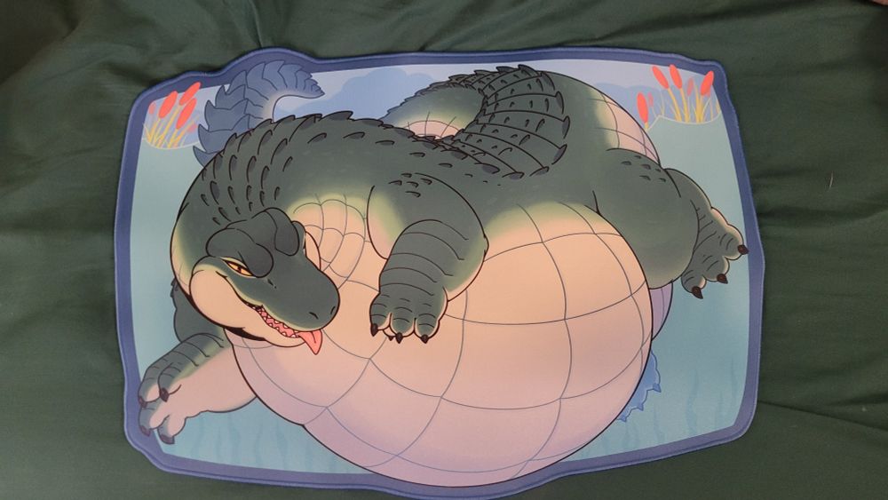 Fat alligator chilling in water mousepad