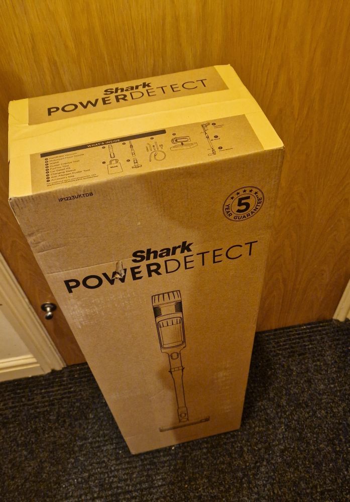 A boxed delivery of a shark hoover