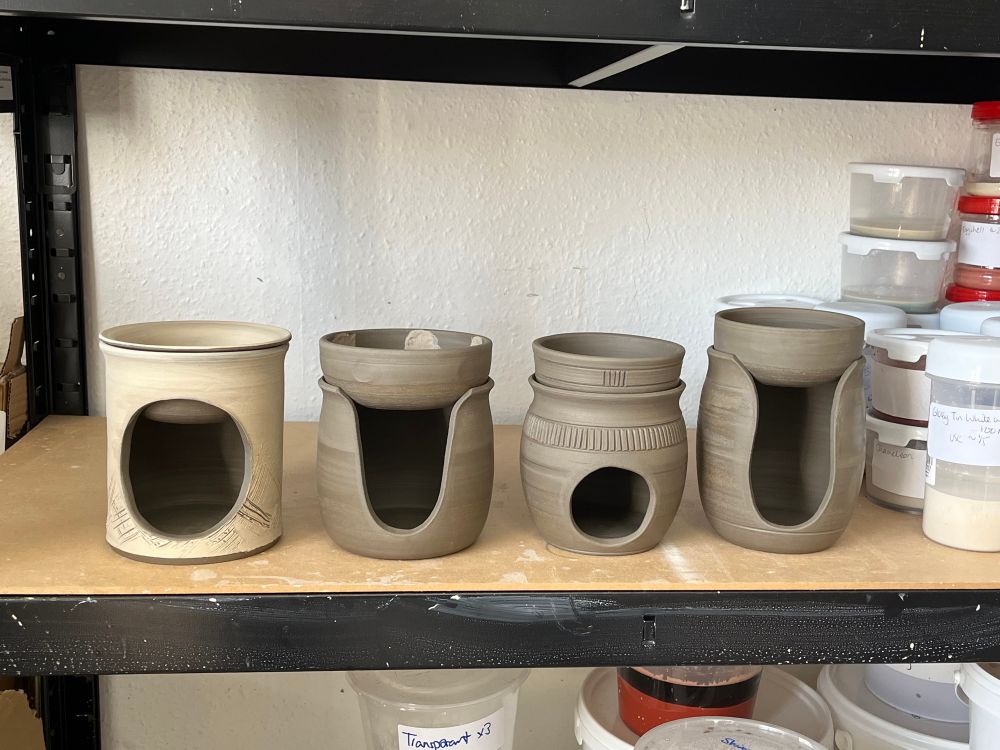 Four leather hard wax melt holders, various shapes and decoration