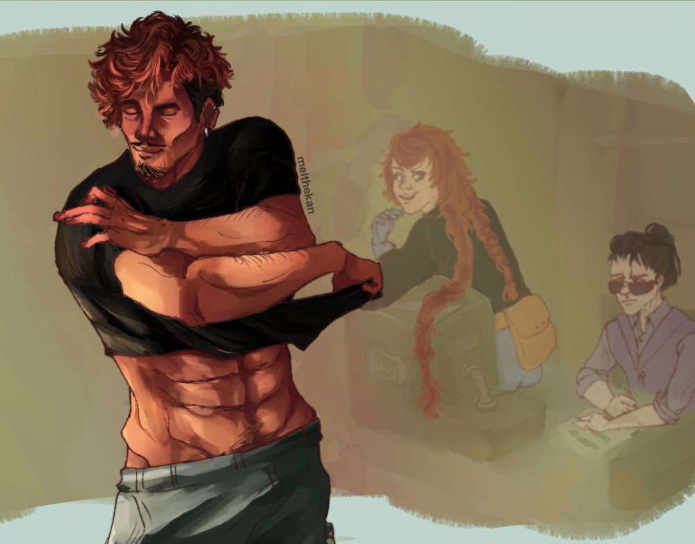 A guy taking off his shirt while there are two women looking at him