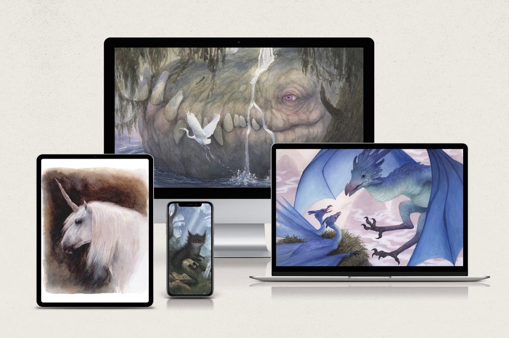 a mockup of a desktop, laptop, ipad and smartphone with my artwork on the screens. There's a blue dragon, a unicorn, a small black furry beast and a big peaceful looking dragon