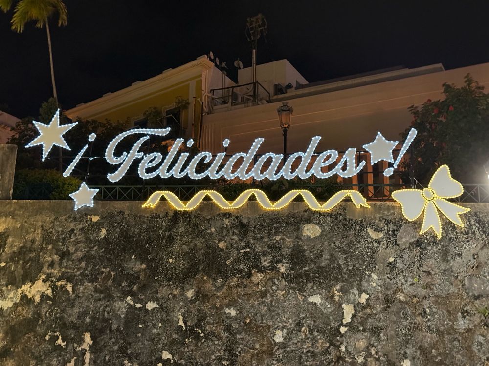Holiday lights spelling out “¡Felicidades!” In Spanish, San Juan, PR