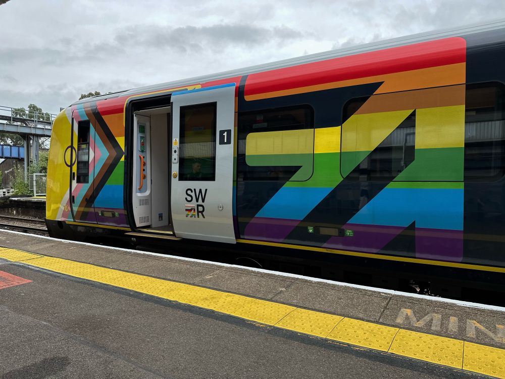 South West Railway (UK) train in LGBTQ+ pride rainbow livery