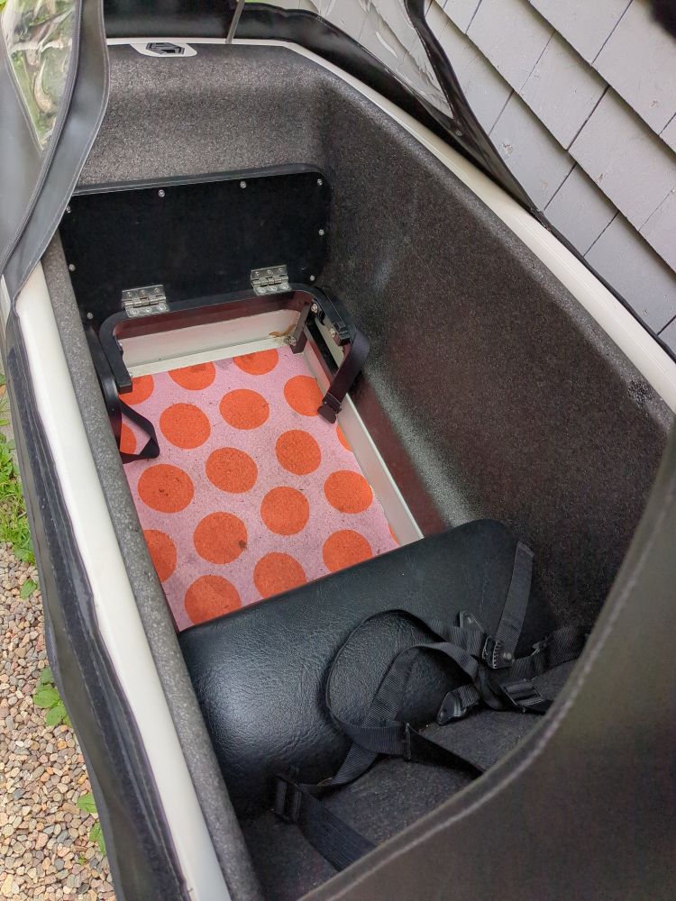 Pink and orange polka dot mat on the floor of the urban arrow. 