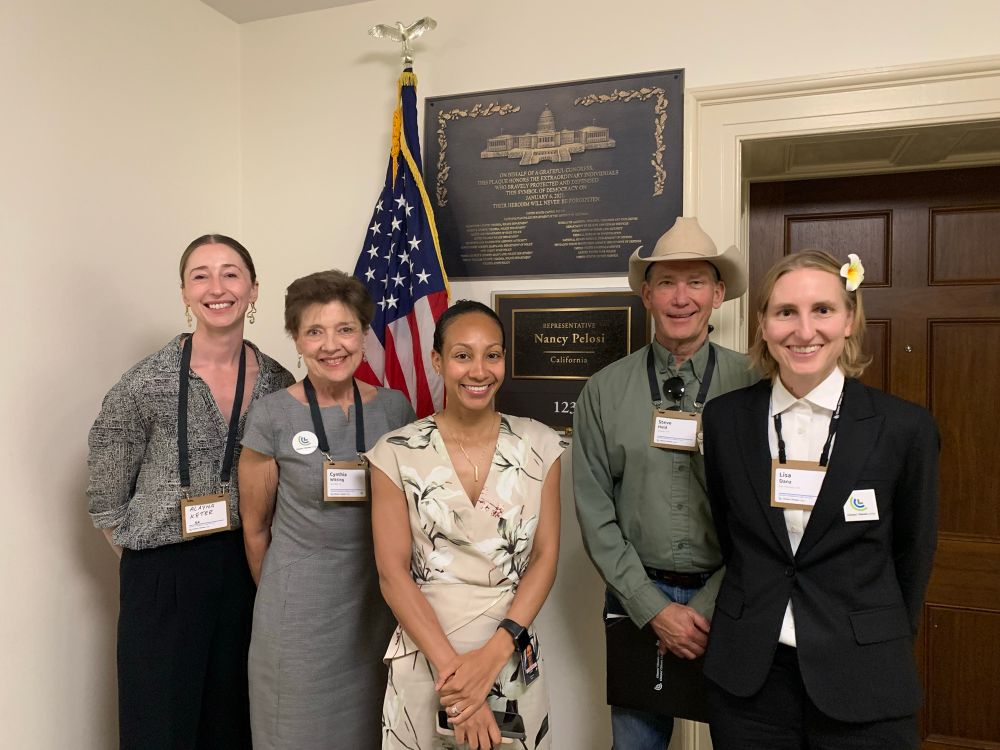 CCL volunteers posing in front of Nancy Pelosi’s office with her staff member McKenzie. 