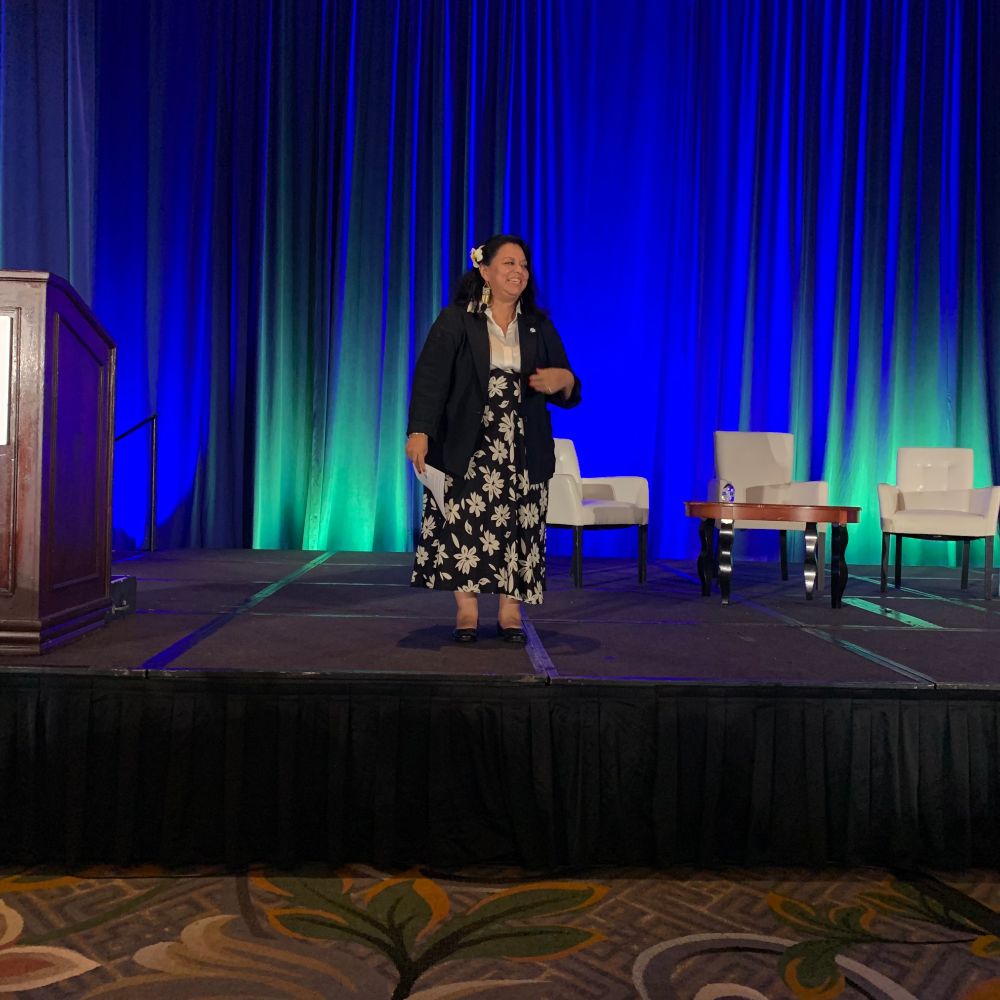 Karina Ramirez giving closing remarks at Citizens' Climate Lobby conference.