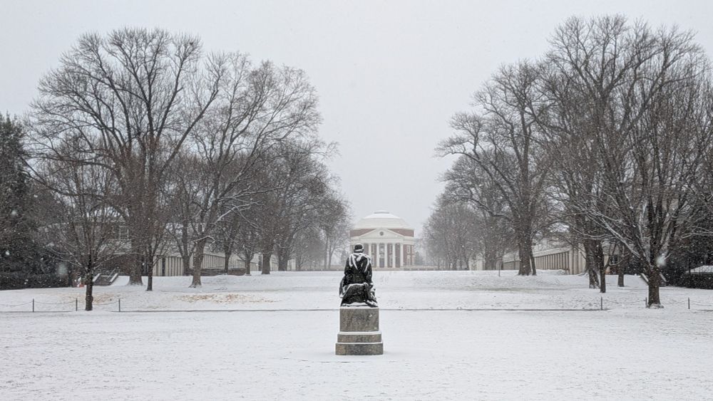 The Lawn at the University of Virginia, covered in snow, looking towards the Rotunda.