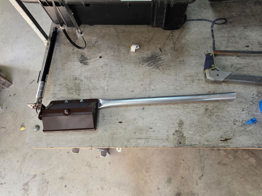 Painted and pole mounted solar light with antenna