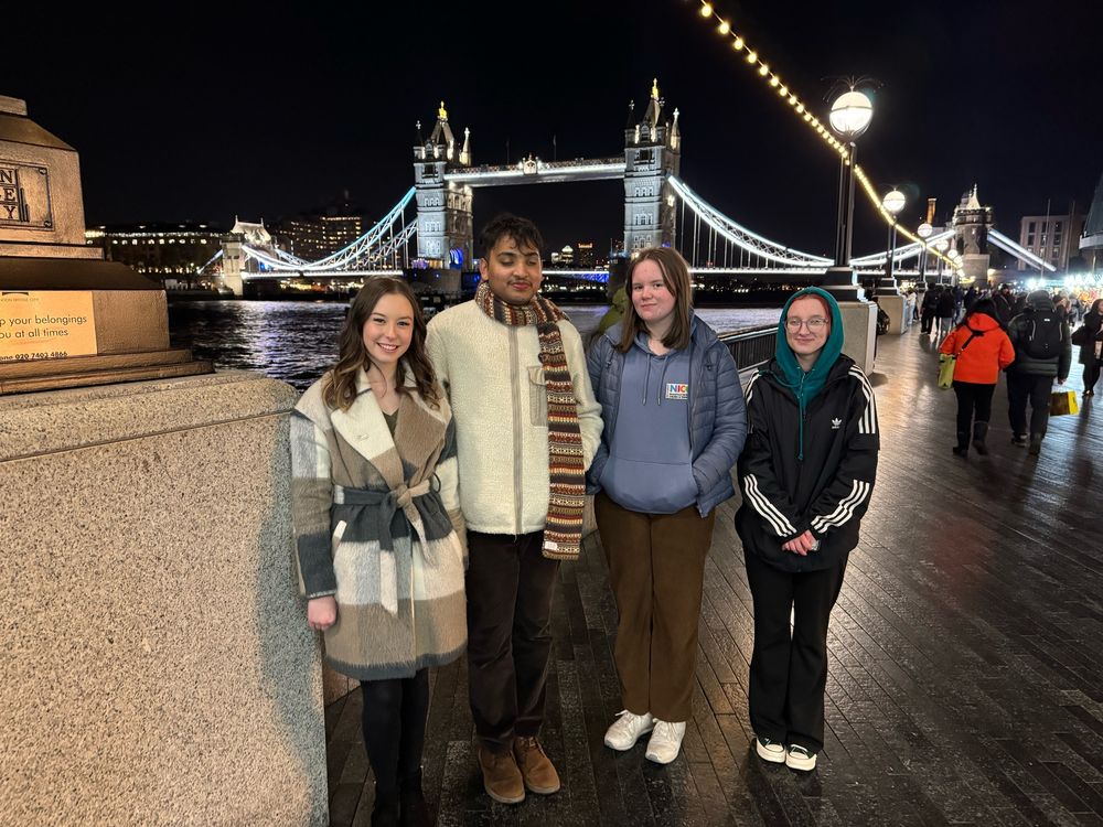 4 Votes at 16 campaigners in London. Tower Bridge behind. 