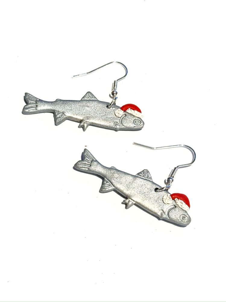 Silver fish earrings wearing santa hats