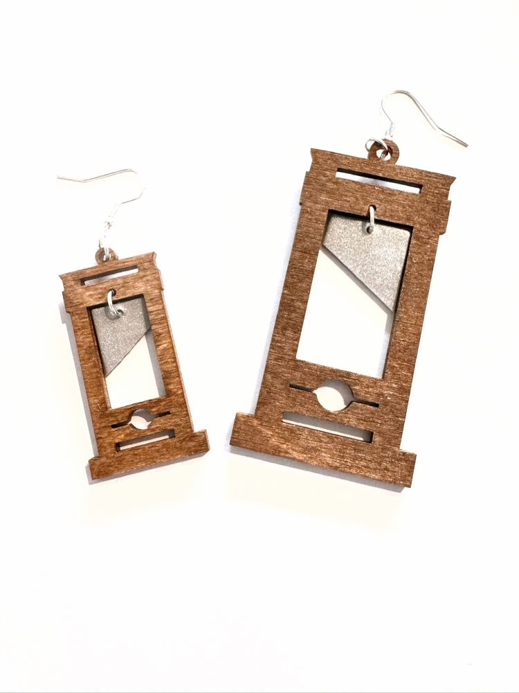 Earrings that look like guillotines
