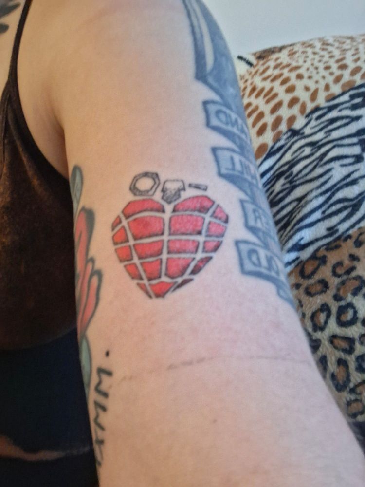 Red heart hand grenade tattoo from Green Day's American Idiot
