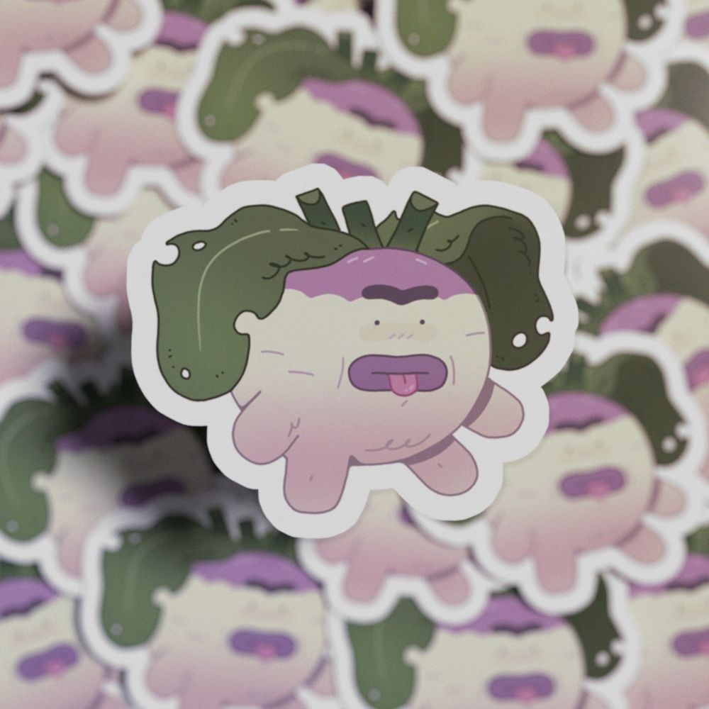 mock 3D sticker design made in blender that shows how the sticker would look one printed, turnip character design that is sticking their tongue out and looks blankly, soft pinks and creams paired with light purple and dark green leaves that resemble some type of hair, character is in focus above a bed of stickers that are out of focus, there's depth and makes the sticker design pop