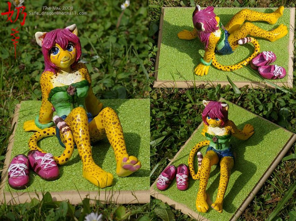 Figurine of a cheetah girl made from super sculpy in 2008 for my dear friends 21st birthday. 

It's been a long time since I made a figurine... Maybe I should do one of Nai?✨💙✨