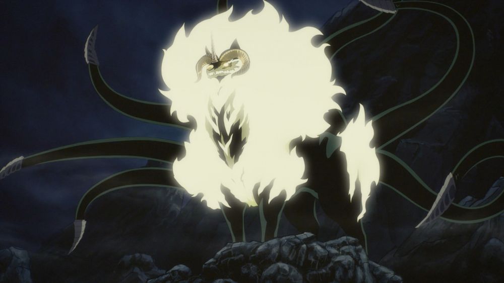 large black canine-ish creature with seven tails, two ram-like horns on its head, another pointy unicorn-like horn on its snout, glowing white eyes, and a massive glowy white mane.