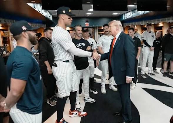 Aaron Judge enjoying a shake of the hand with the shittiest war criminal president to ever live 
