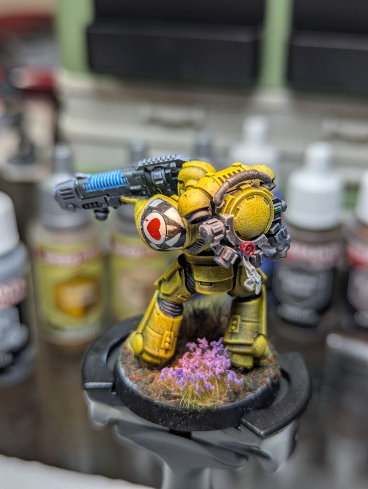 A Lamenters Space Marine Hellblaster, 3rd Company, 9th Squad in his yellow power armor, looking menacing with a backpack fed plasma gun