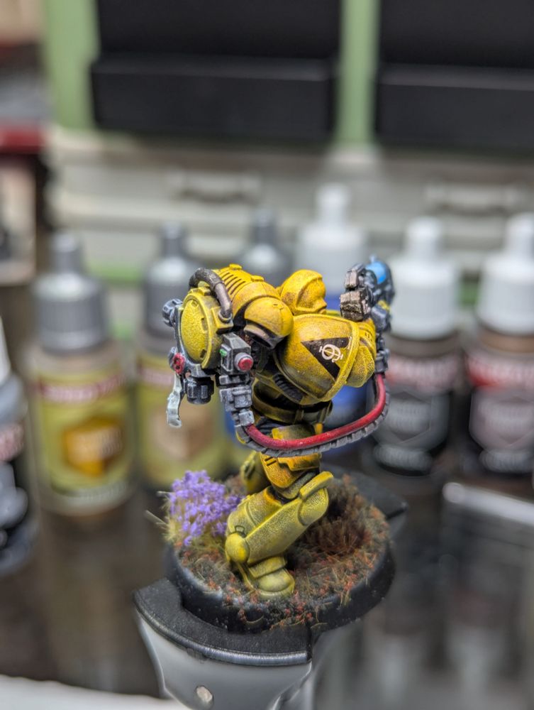 A Lamenters Space Marine Hellblaster, 3rd Company, 9th Squad in his yellow power armor, looking menacing with a backpack fed plasma gun