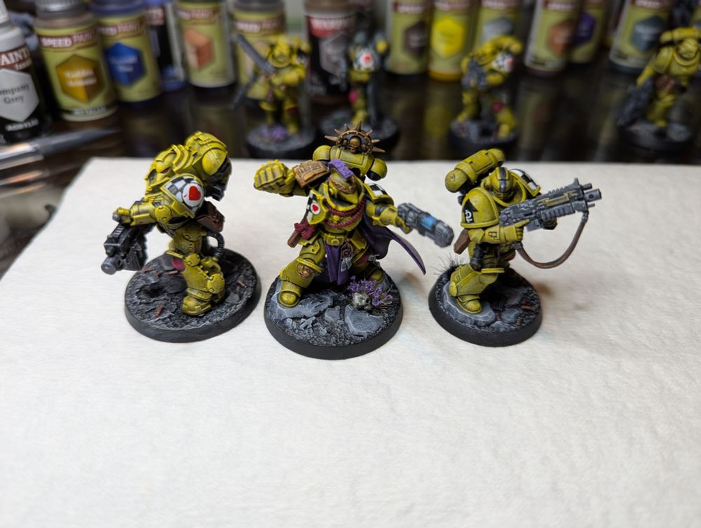 A Lamenters Angels of Death Kill Team for Warhammer 40k, resplendent in their yellow power armor and sad to the core.