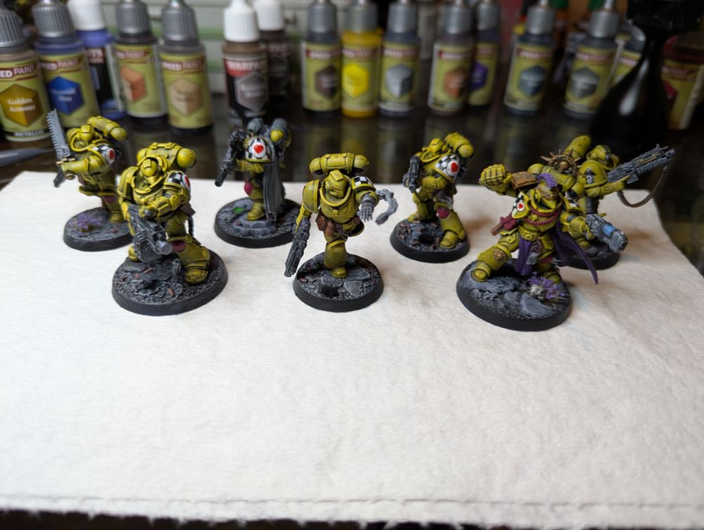 A Lamenters Angels of Death Kill Team for Warhammer 40k, resplendent in their yellow power armor and sad to the core.
