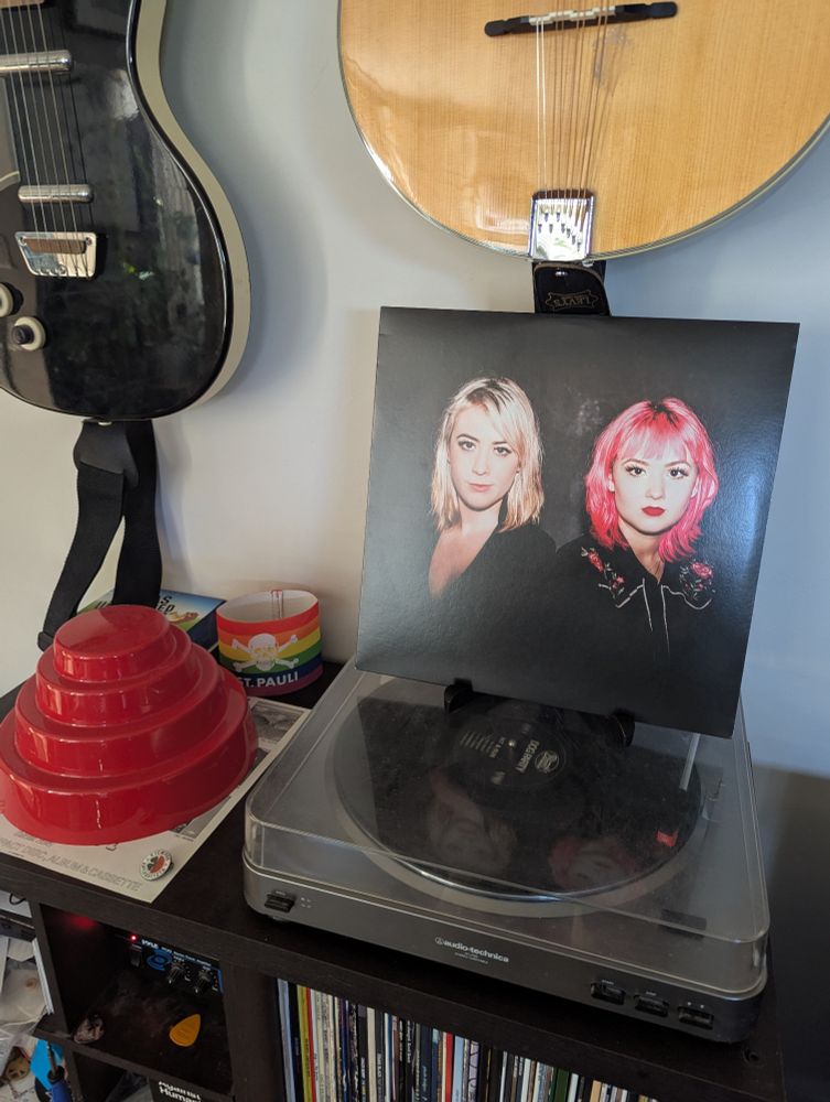 Dog Party's album Hit and Run on the turntable 