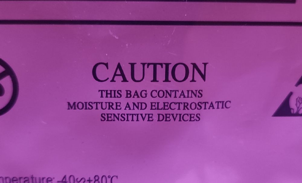 caution: this bag contains moisture and electrostatic sensitive devices