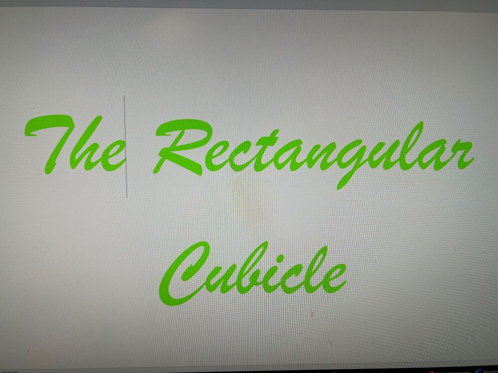 The Rectangular Cubicle in script on a screen