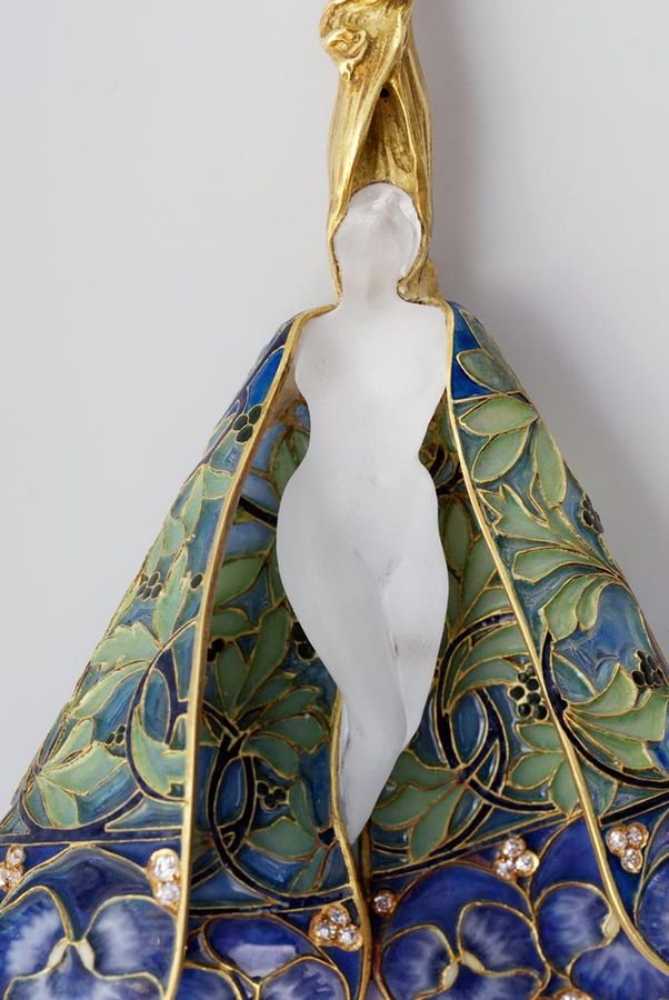 pendant from front, with frosted glass figure of woman centered