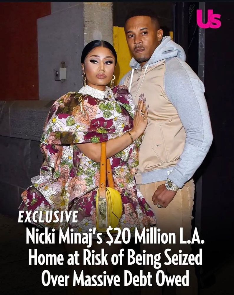 A photo of Nicki Minaj and her husband. The photo is watermarked with US Weekly’s logo and has the following caption written on it: EXCLUSIVE. Nicki Minaj’s $20 Million L.A. Home at Risk of Being Seized Over Massive Debt Owed