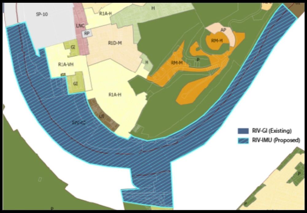 Image displaying proposed changes to Hazelwood Riverfront, according to the recent D5 newsletter: "Legislation to rezone a large section of Hazelwood’s riverfront from 'Riverfront General Industrial' to 'Riverfront Industrial Mixed-Use.' This would block new heavy industrial uses that bring smoke, noise, and other hazards, while opening the door to more compatible development such as multi-unit housing, retail, and light industry."