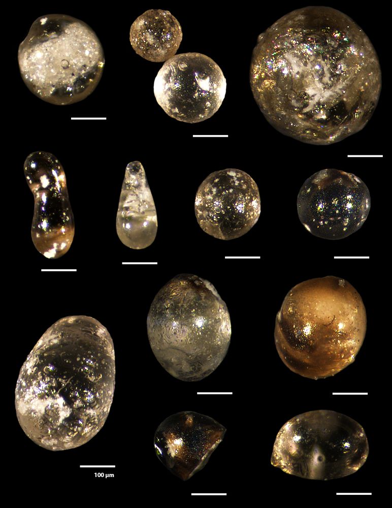 Droplets (or microspherules) of silica. These form after silica-containing rocks get vaporised by an asteroid. The silica end up in the atmosphere, but solidify into droplets as they cool. These were found in the rock analysed in the study. 