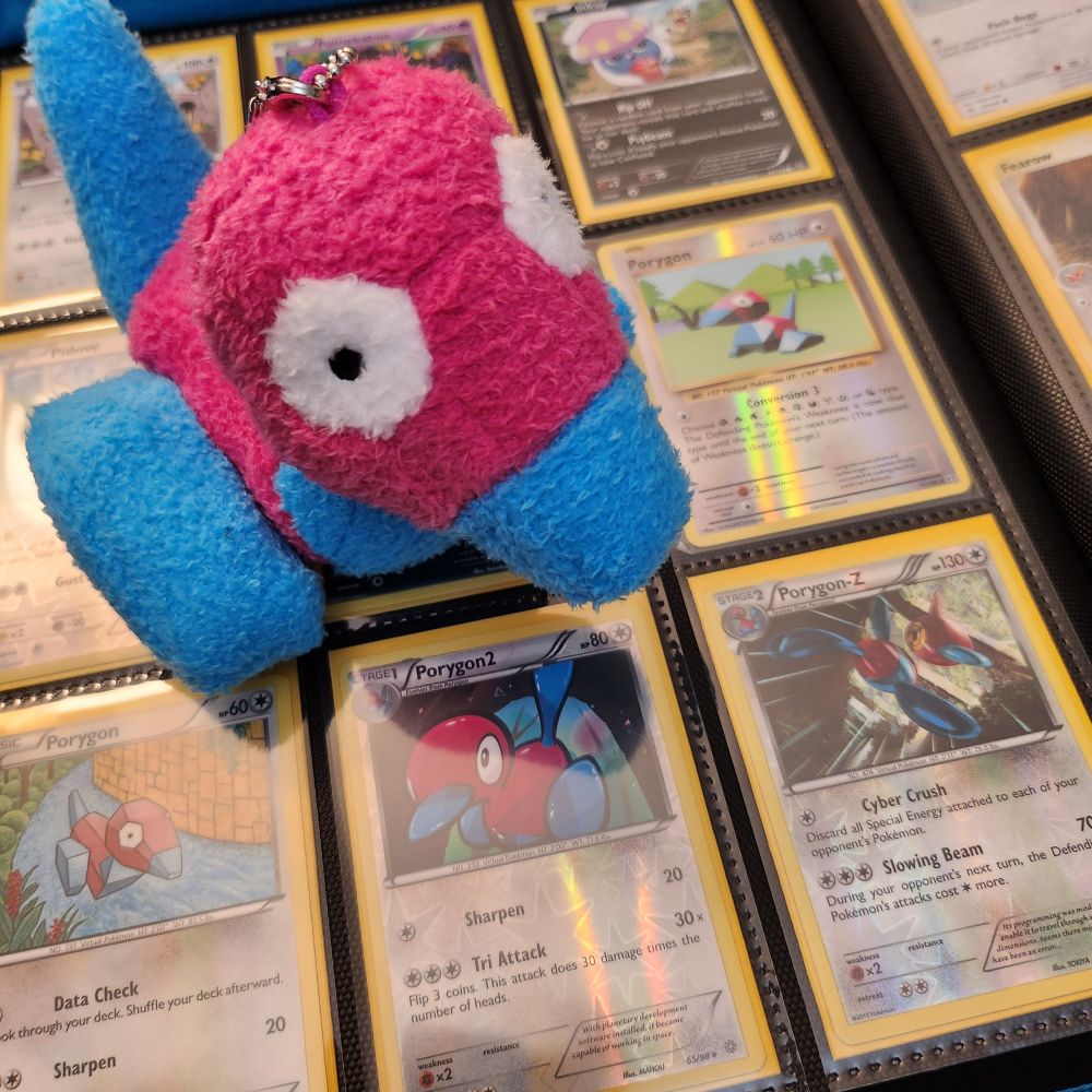Plush porygon with porygon cards 

Porygon 