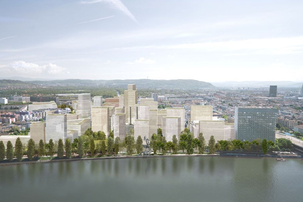 Visualisierung des Klybeckplus-Areals vom Rhein aus gesehen. Dicht bebaut mit Hochhäusern und ein paar wenigen Bäumen zur Garnitur.